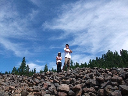Two Seattle youth survey the vast “Chinese Walls” at the Ah Hee Diggings.