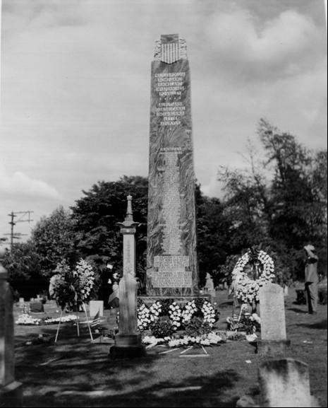 The Nisei War Memorial Monument was dedicated in 1949. The 21-foot column of rainbow granite is carved with the names of 56 Japanese American soldiers from Seattle and surrounding areas who gave their lives during World War II. The inscription from President Franklin D. Roosevelt, who issued Executive Order 9066 that resulted in the forced incarceration of Japanese and Japanese Americans during World War II, reads: Americanism is a matter of the mind and heart; Americanism is not, and never was, a matter of race or ancestry.