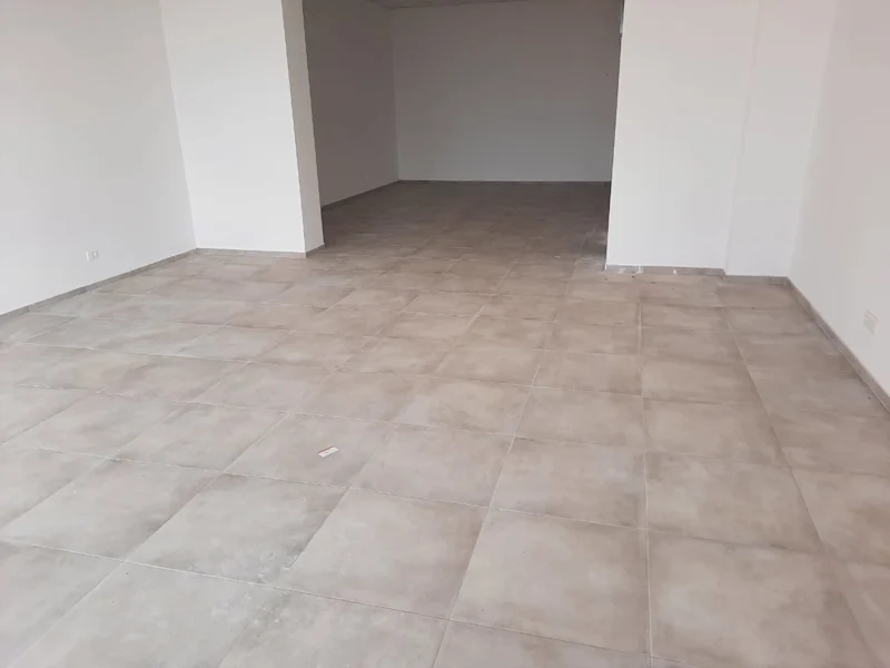 Commercial space of 75.6 m² for sale in Veternik, featuring a beautiful view of Prishtina. The space is suitable for various business activities. - Image 4