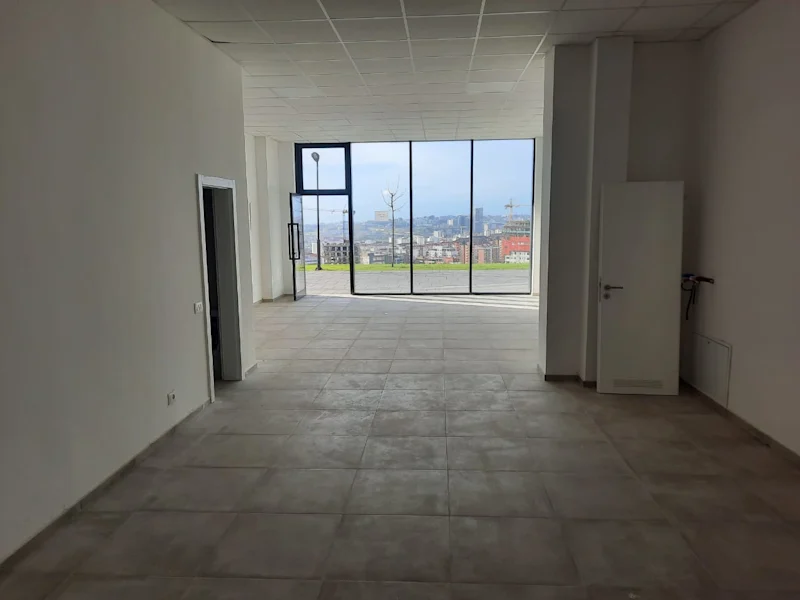 Commercial space of 75.6 m² for sale in Veternik, featuring a beautiful view of Prishtina. The space is suitable for various business activities. - Image 2