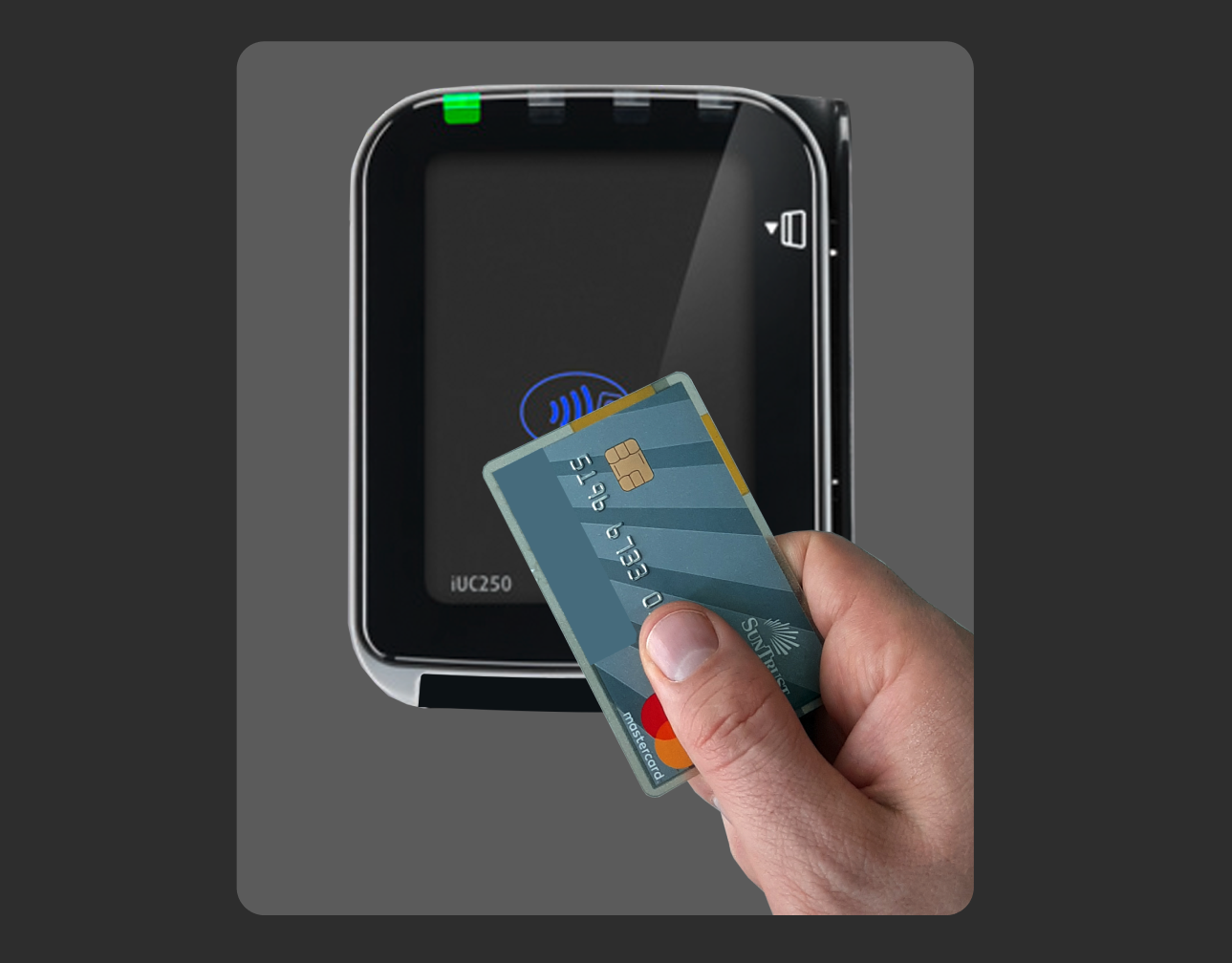 image of a hand tapping a credit card against a credit card reader