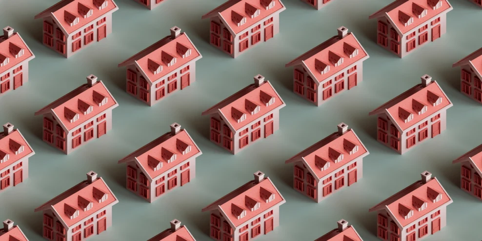 Patroon dat bestaat uit dezelfde type huizen met een rood dak en rode ramen tegen een grijze achtergrond.