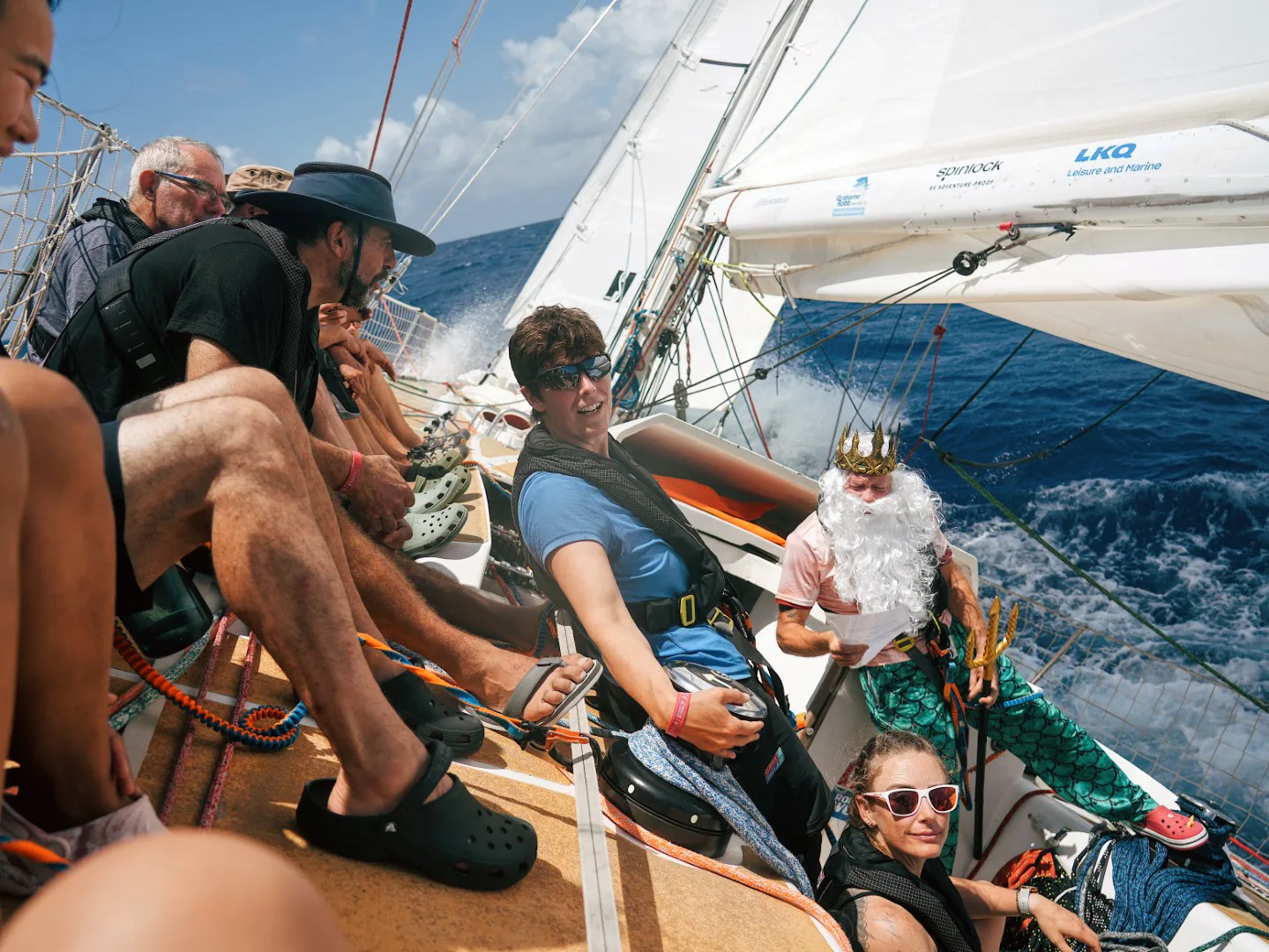Clipper Race crew celebrate crossing the Equator with a traditional maritime ceremony, marking a memorable milestone in their ocean racing journey.
