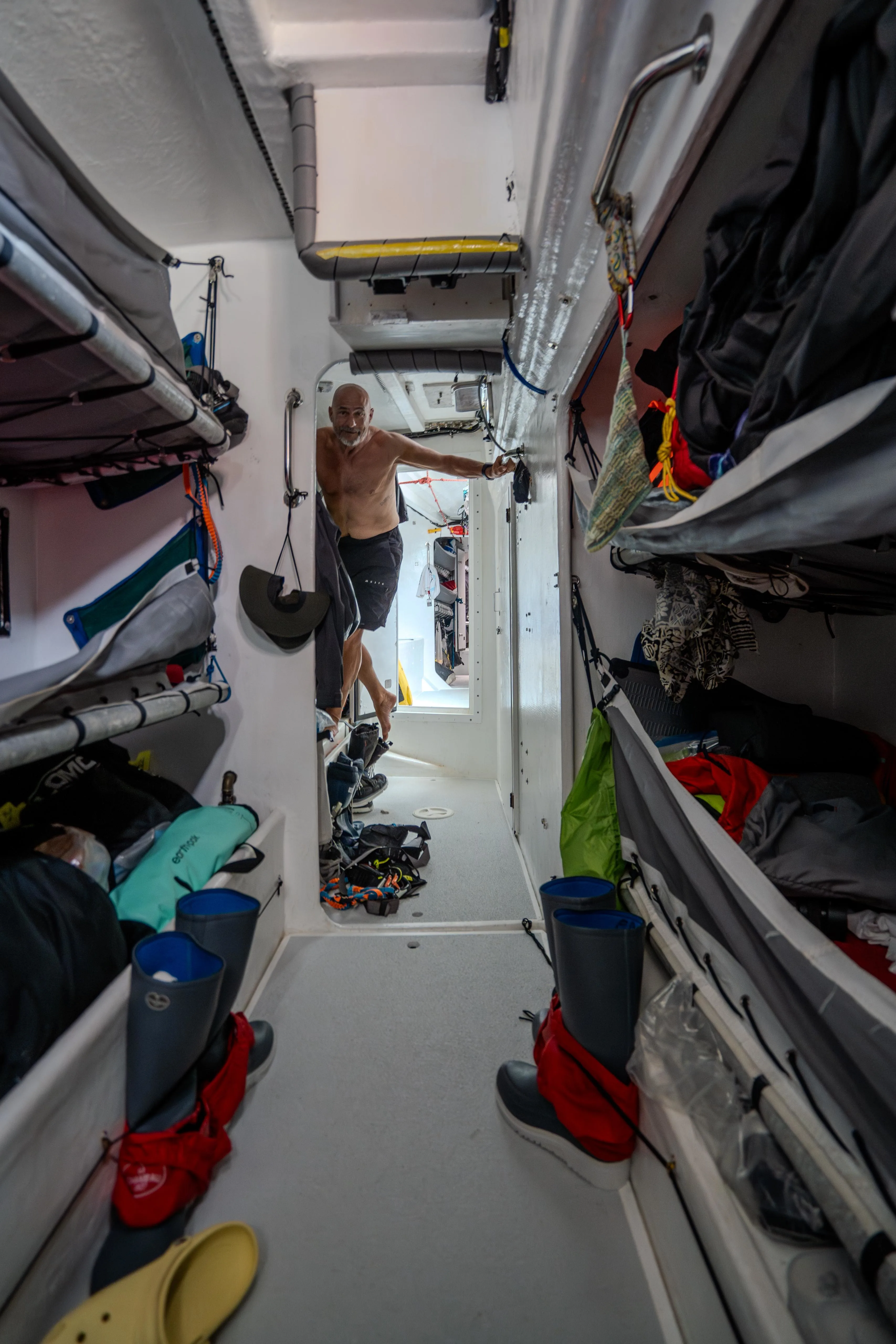 Explore life below deck on a Clipper Race yacht, featuring crew bunks, storage and living spaces designed for endurance ocean racing adventures.