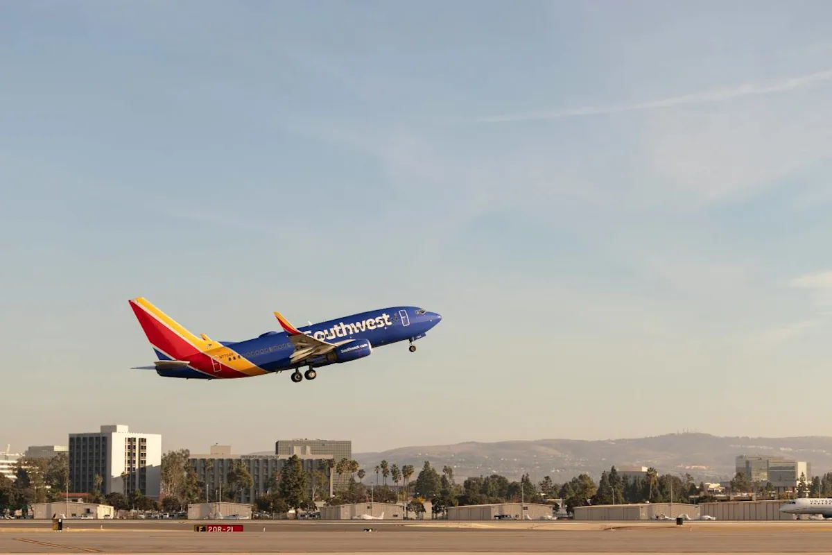 A traveler flying with a companion, illustrating how to earn the Southwest Companion Pass.