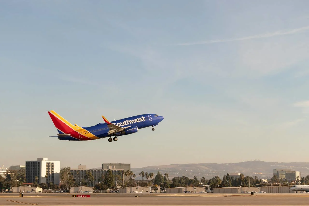 A traveler flying with a companion, illustrating how to earn the Southwest Companion Pass.