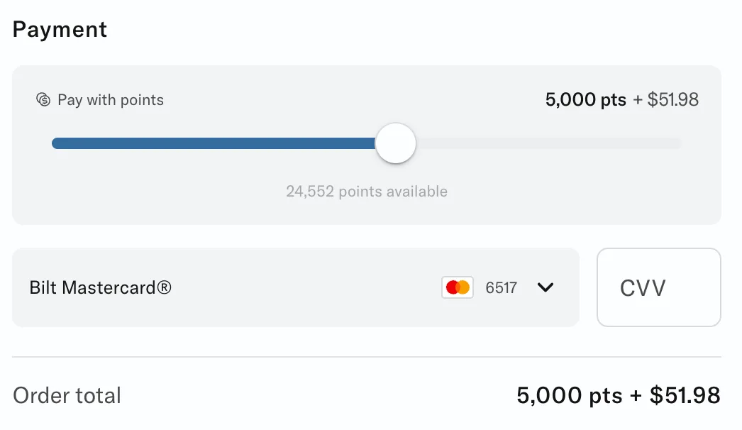 Screenshot of the Bilt travel portal payment screen applying 5,000 points plus $51.98 toward a Southwest flight