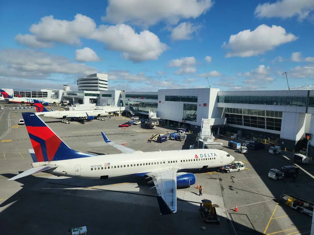 A Delta aircraft paired with Capital One miles, illustrating how to use Capital One miles on Delta.