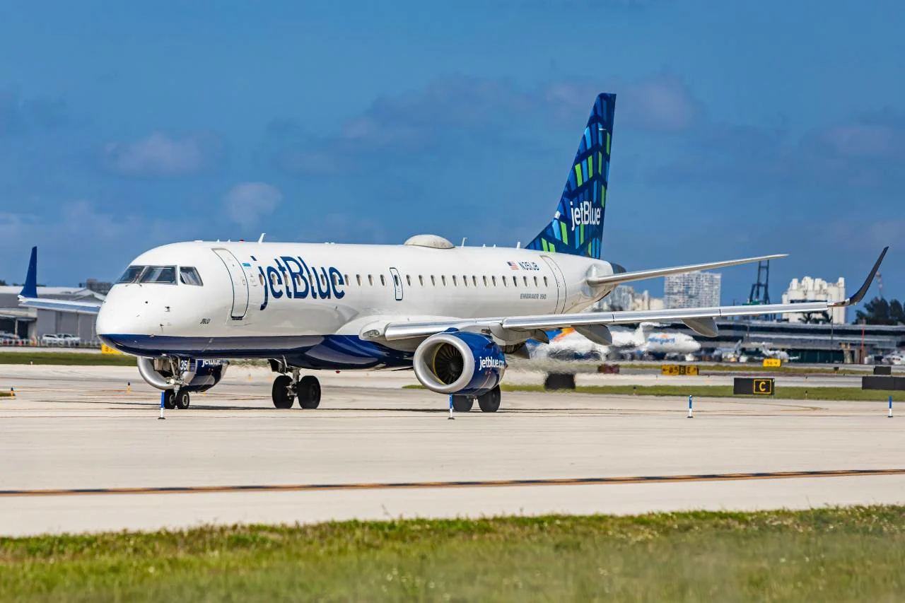 A JetBlue aircraft with points iconography, illustrating how much JetBlue TrueBlue points are worth.