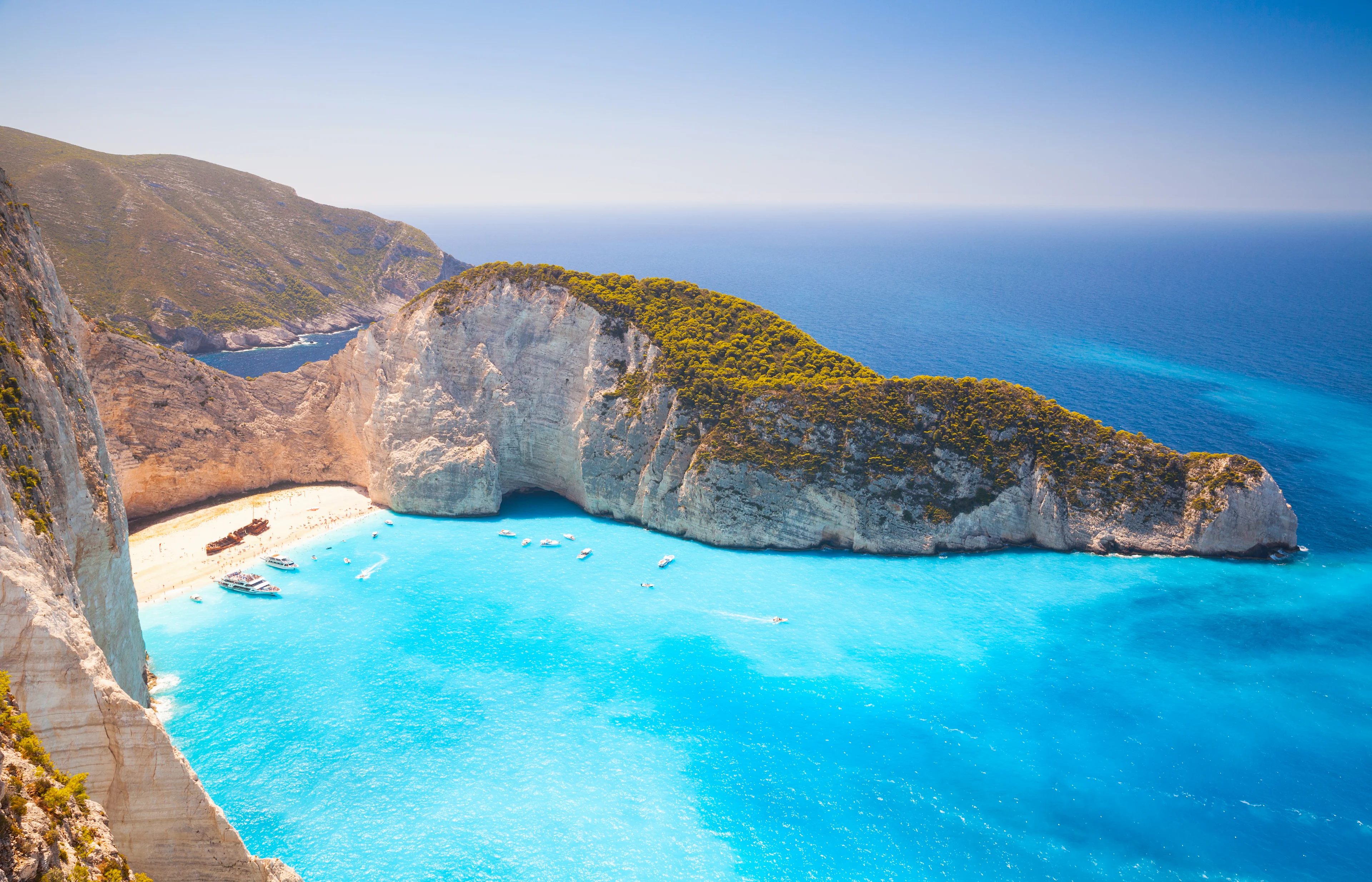A scenic European coastline in summer, illustrating how to book an affordable Eurotrip using points.