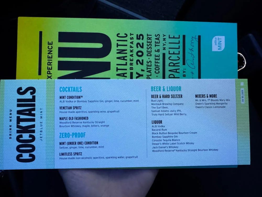 JetBlue Mint drink menu listing cocktails, zero-proof options, beer, and liquor selections