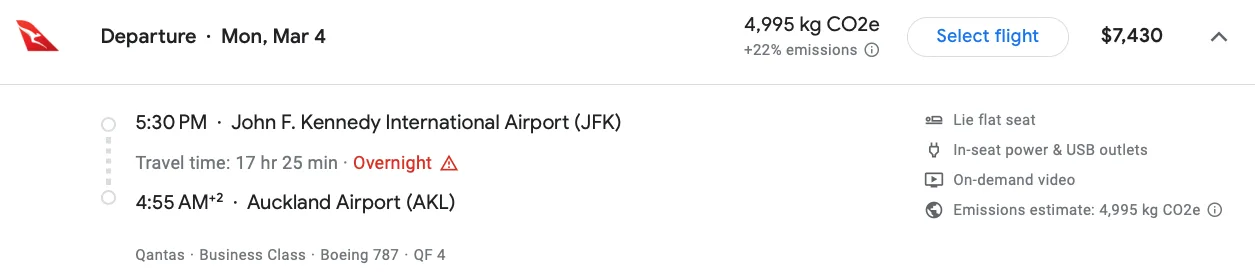 Screenshot of a Qantas business class booking from JFK to Auckland, priced at $7,430, highlighting the lie-flat seat and in-seat power.