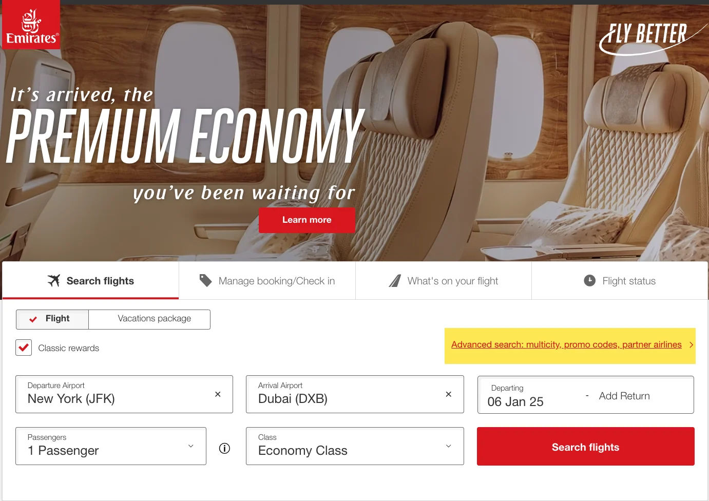 Emirates website banner announcing its new Premium Economy cabin, with a flight search form for JFK to Dubai below