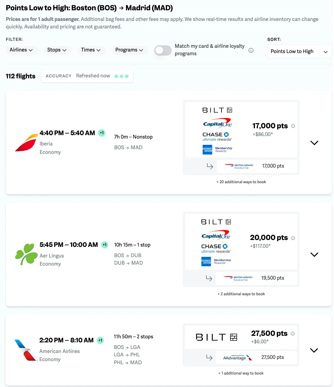 Screenshot of point.me search results listing Boston to Madrid award flights on Iberia, Aer Lingus, and American Airlines with points pricing