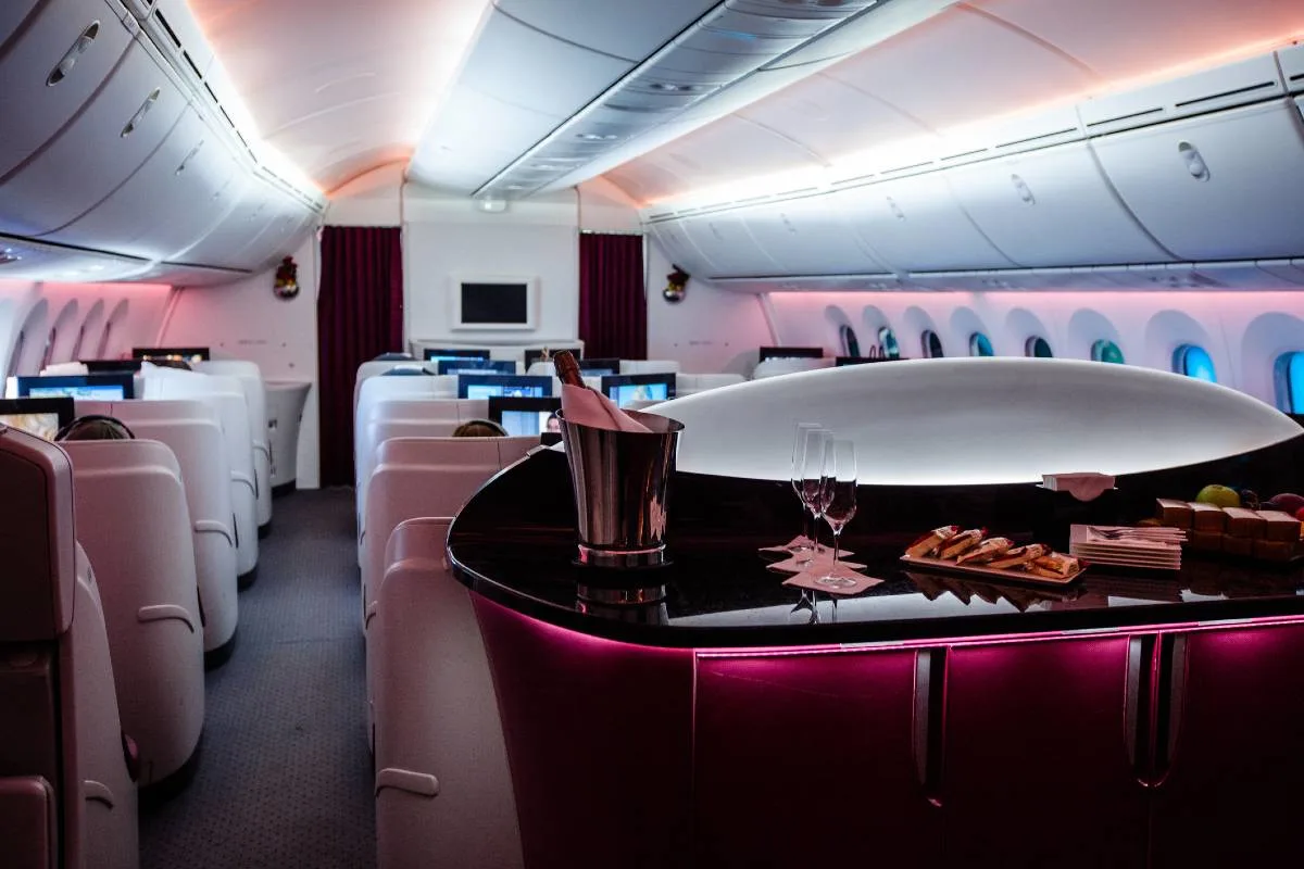 A spacious business class cabin, illustrating how to find cheap business class flights with points.