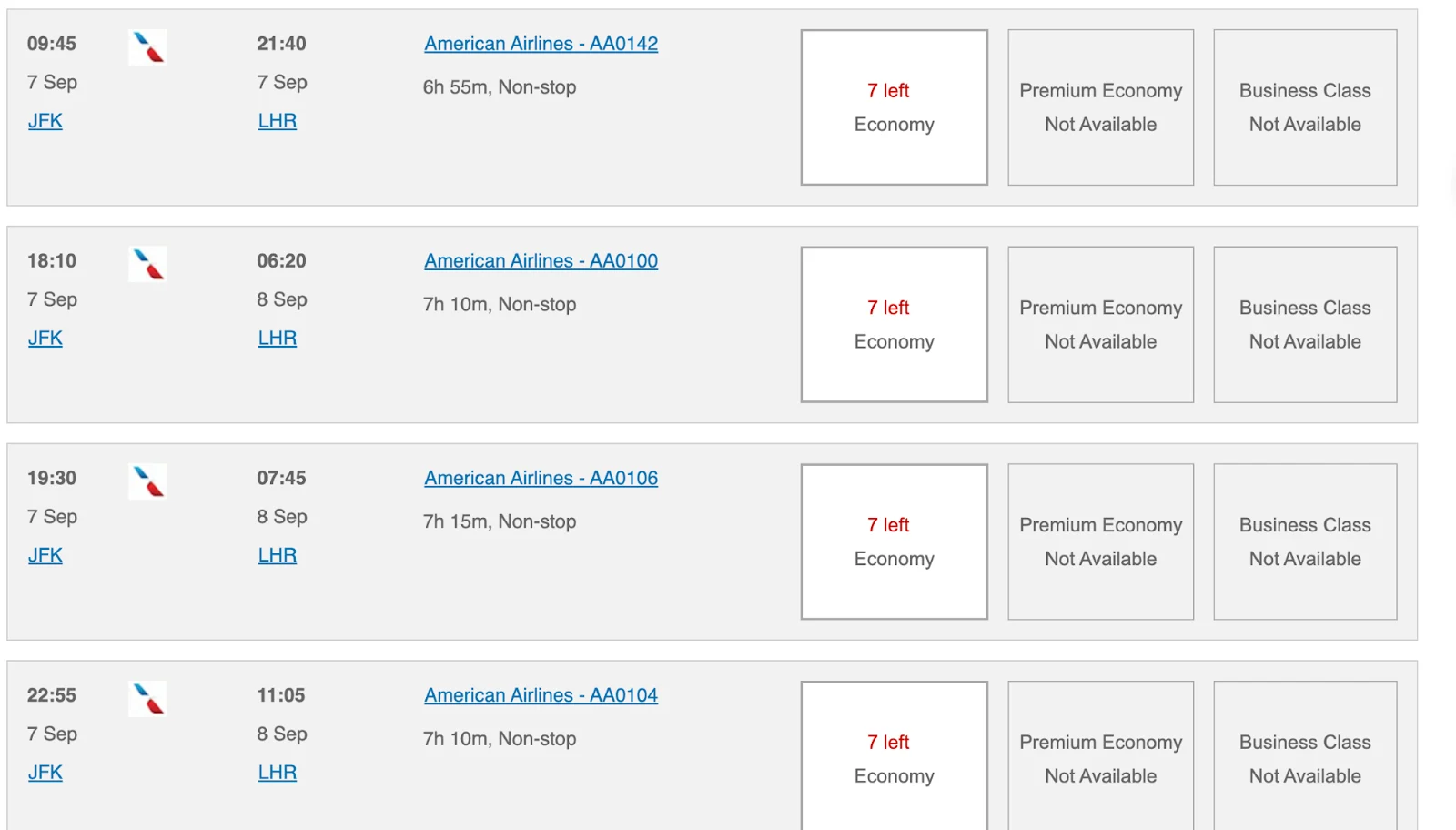 Screenshot of American Airlines flight search results listing several JFK to London Heathrow flights with economy seats available and business class not available