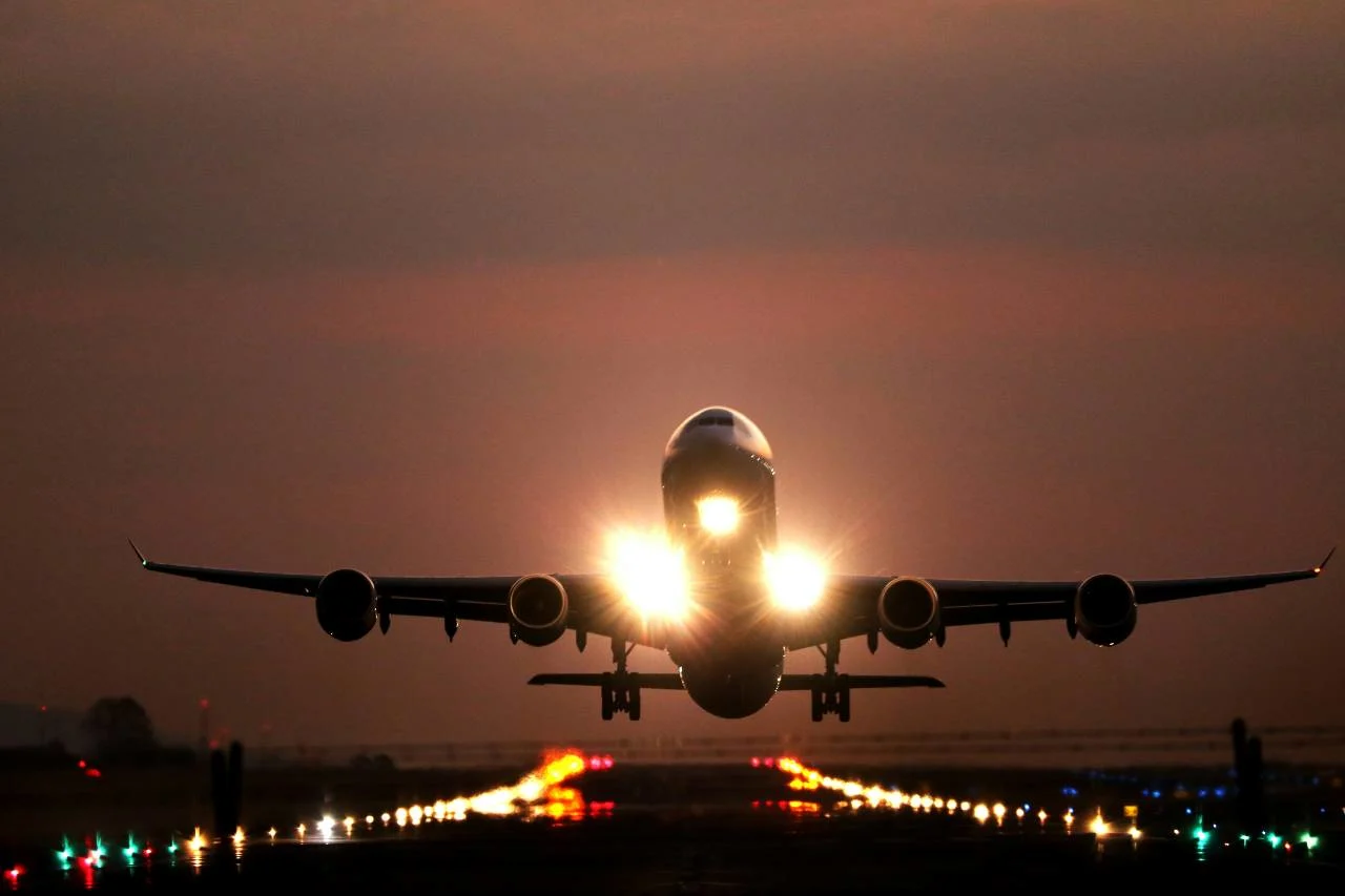 A traveler booking a flight on short notice, illustrating how to book last-minute flights with points.