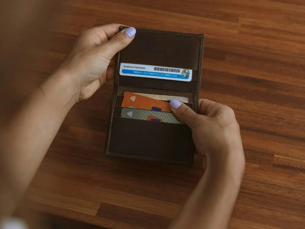 A new travel rewards credit card with holiday gifts, illustrating why year-end is the best time to apply.