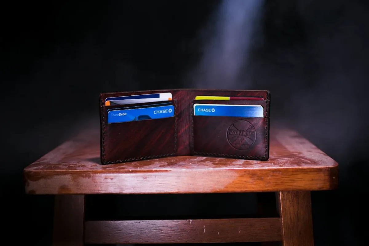 Chase Sapphire Reserve credit card shown with travel rewards visuals, illustrating point.me's review of its 2026 refresh.