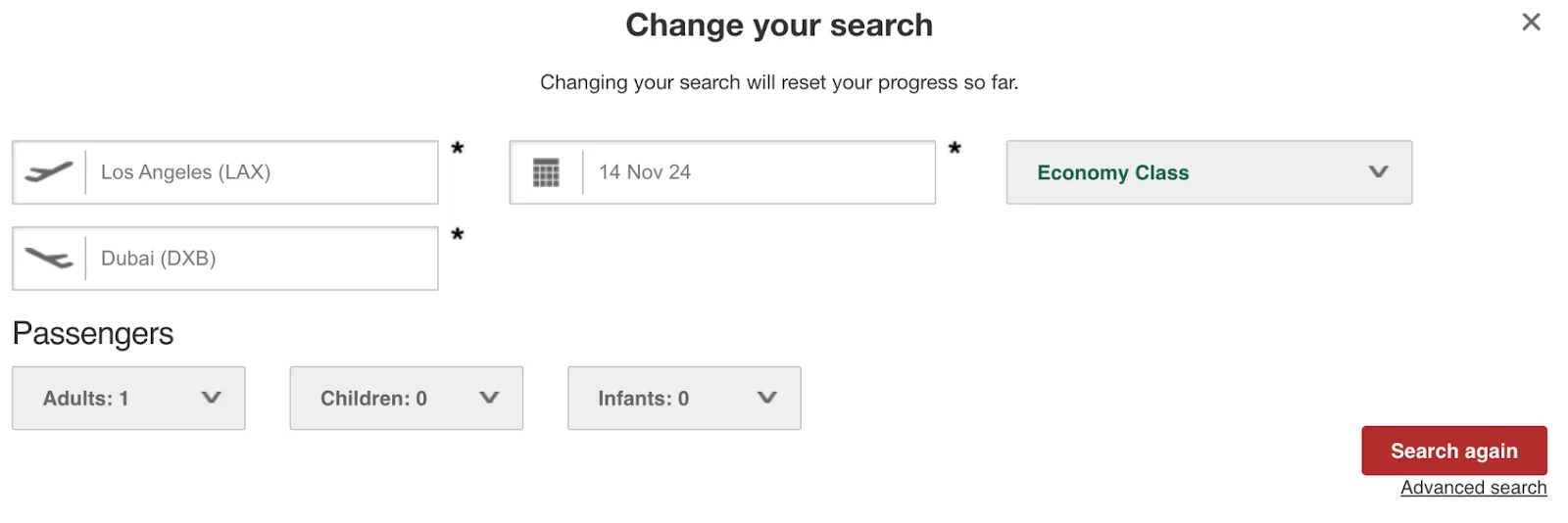 Screenshot of a flight search form set for a one-way Los Angeles to Dubai Economy Class booking