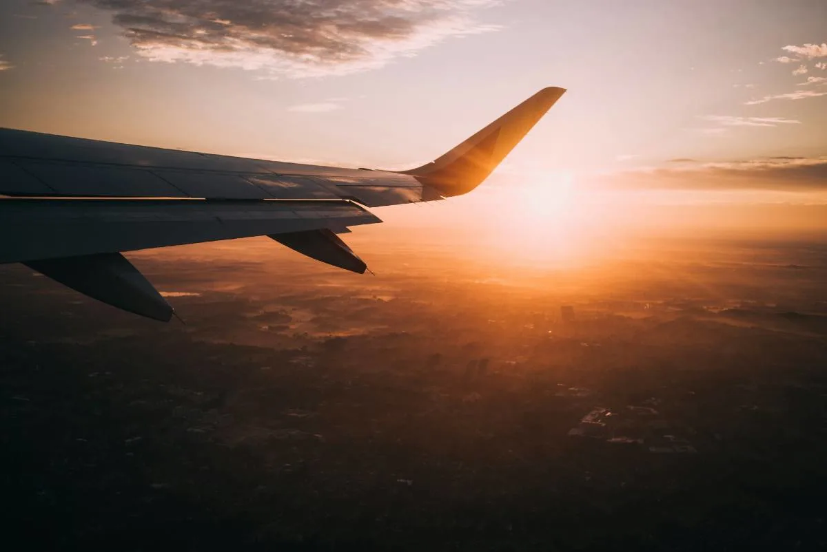 Credit card points transferring to airline and travel partners, illustrating how to move and redeem rewards for flights.