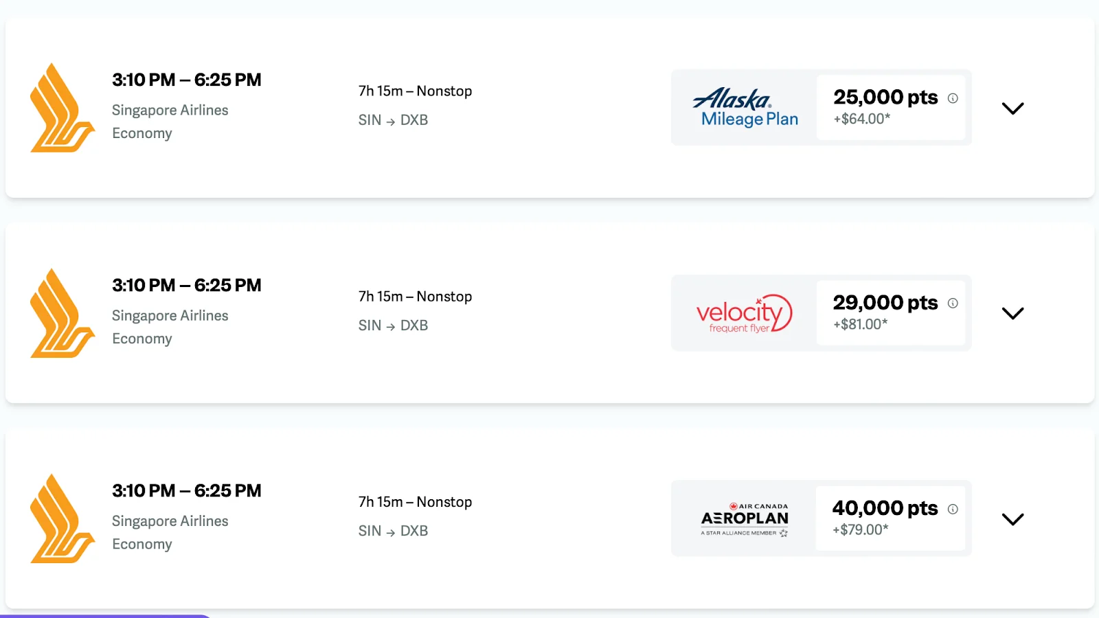Screenshot of Singapore Airlines award options for a Singapore to Dubai economy flight, transferable through Alaska Mileage Plan, Velocity, or Aeroplan for 25,000 to 40,000 points