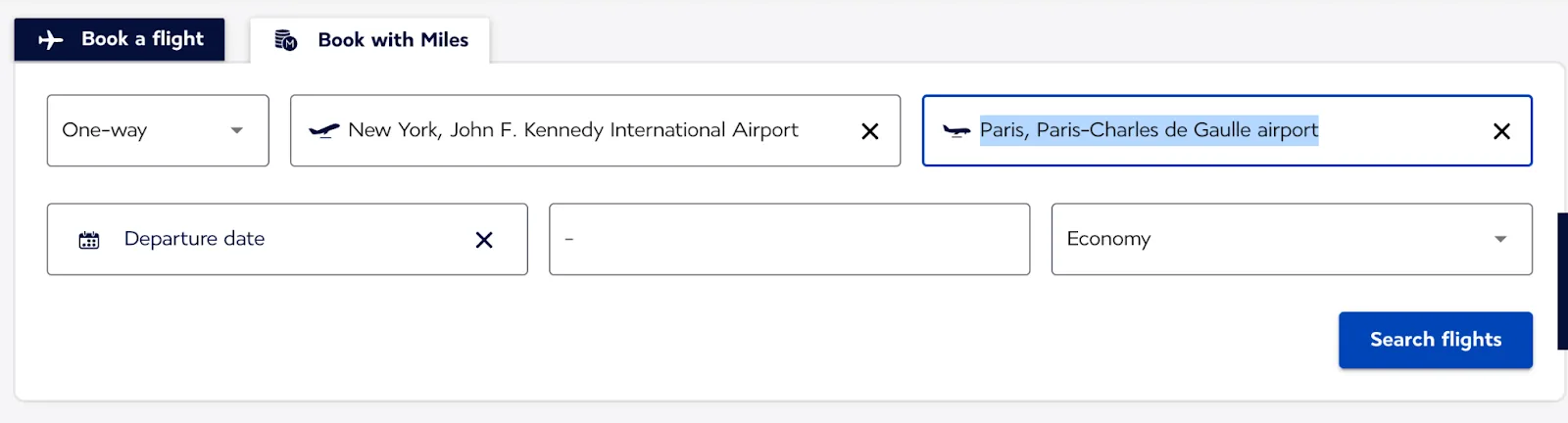 Screenshot of the Air France-KLM Flying Blue 'Book with Miles' search form for a one-way flight from New York JFK to Paris.