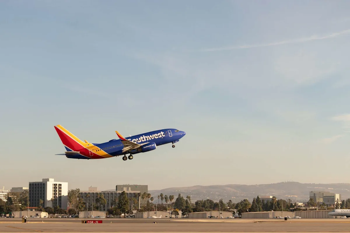 A Southwest Airlines aircraft, illustrating point.me's guides to redeeming and valuing Rapid Rewards points.