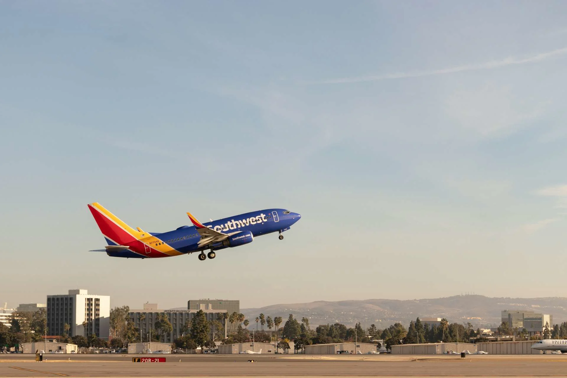 A Southwest Airlines aircraft, illustrating point.me's guides to redeeming and valuing Rapid Rewards points.
