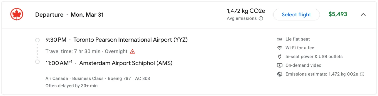Screenshot of a Google Flights search showing an Air Canada business class flight from Toronto to Amsterdam priced at $5,493.