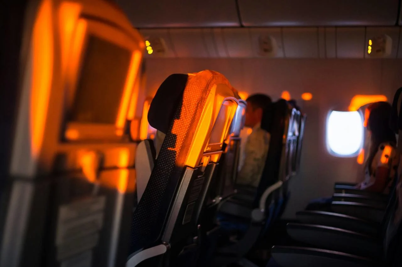 A traveler boarding back-to-back flights, illustrating what a mileage run is and when it's worth it.