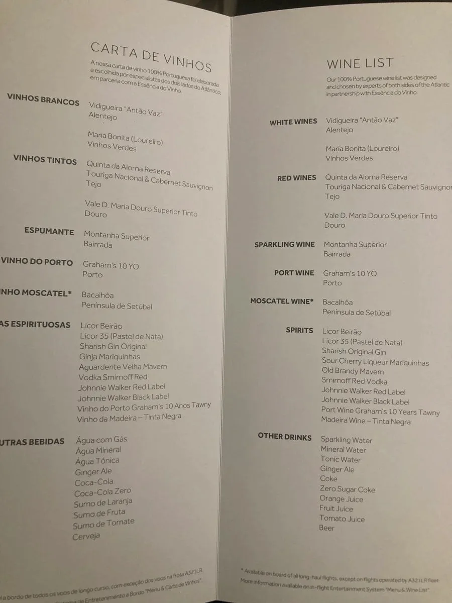 TAP Air Portugal business class wine list menu showing Portuguese white, red, sparkling, and port wine selections.