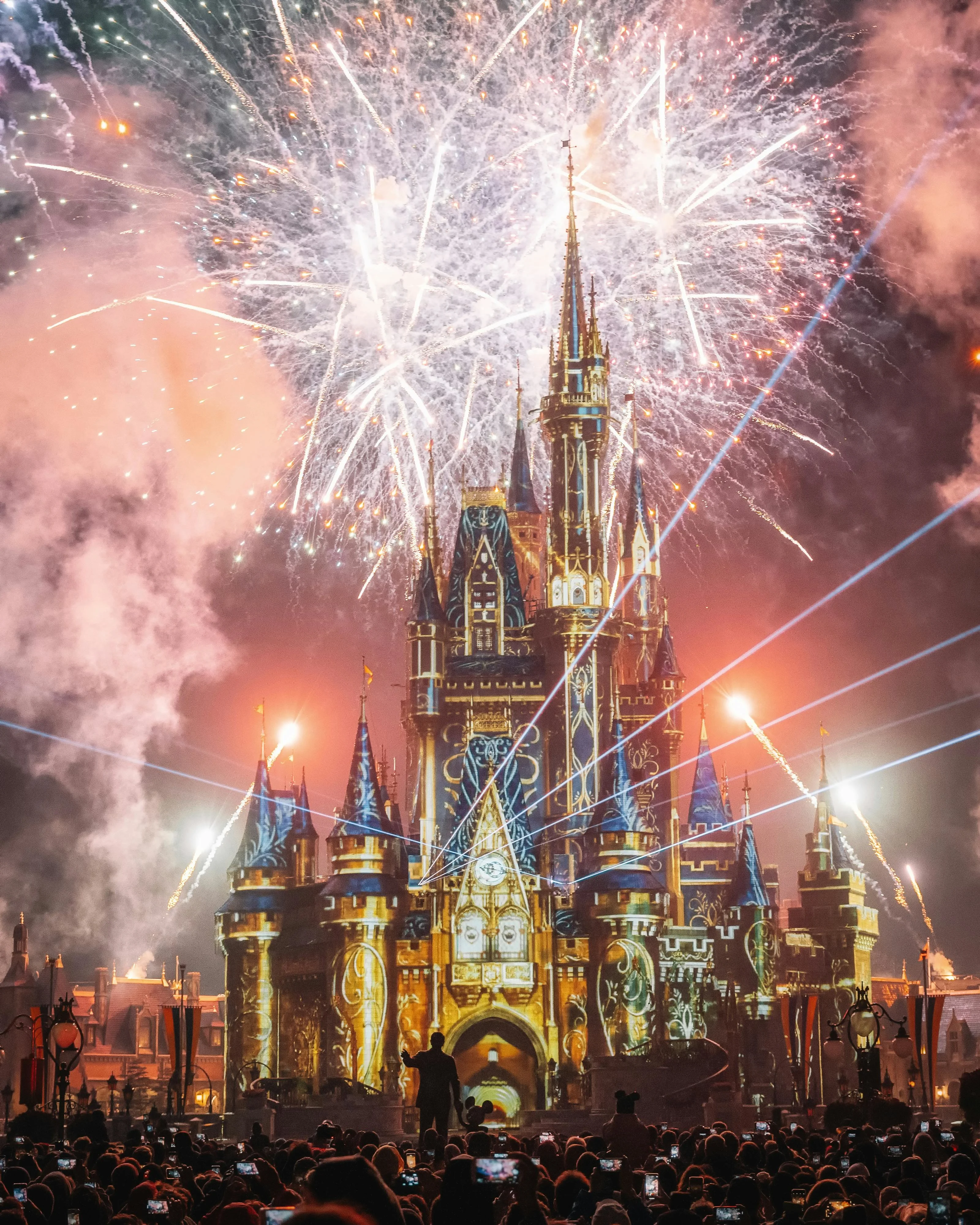 Fireworks and light projections over Cinderella Castle at Walt Disney World's Magic Kingdom in Orlando