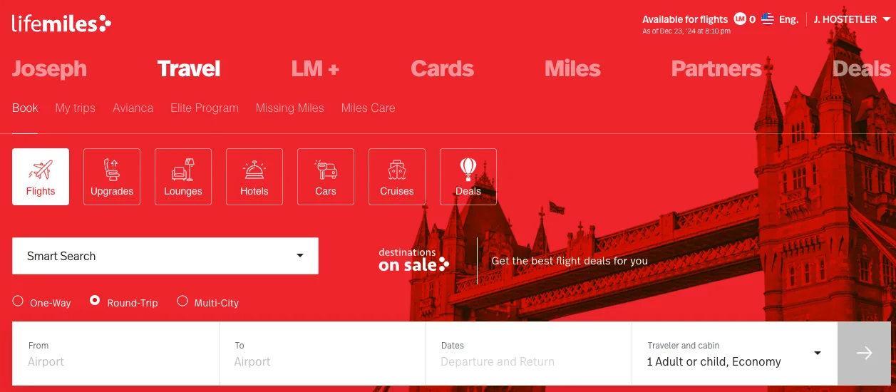 Screenshot of the Avianca LifeMiles homepage showing flight search options over a red-tinted photo of Tower Bridge