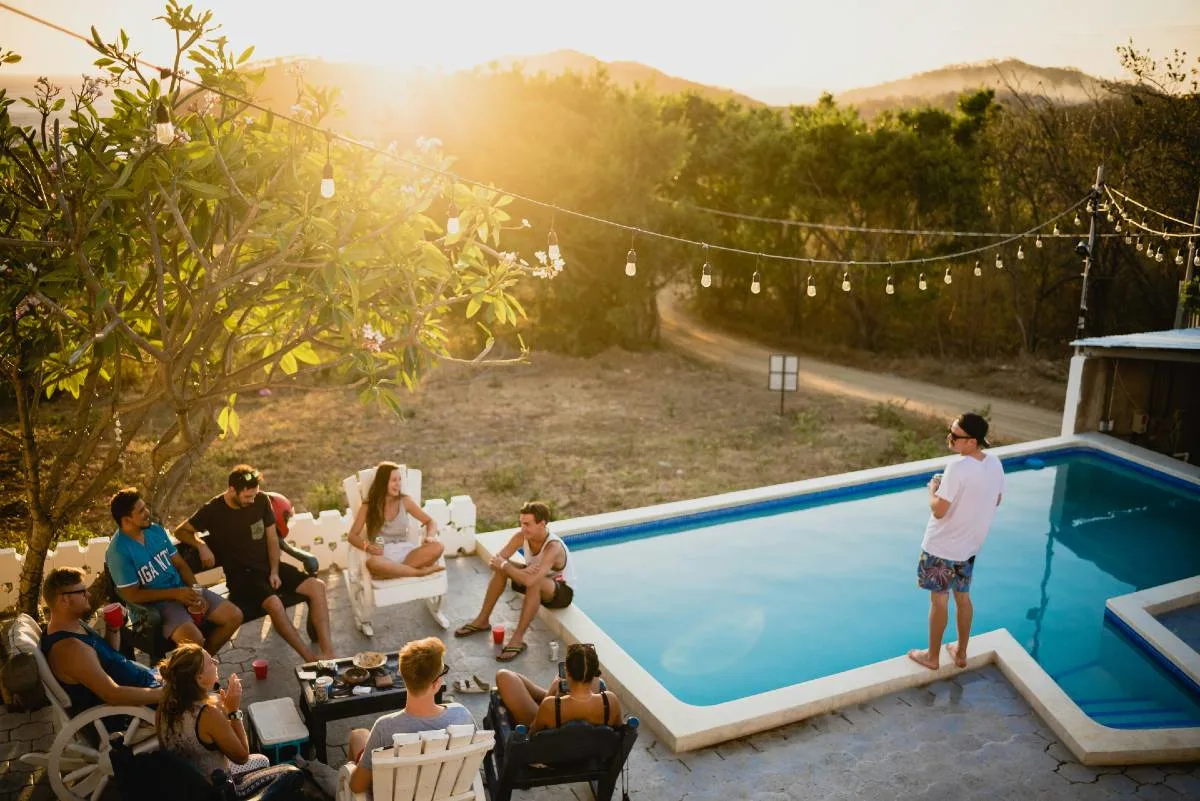 Friends celebrating on a getaway, illustrating how to book a bachelor or bachelorette trip with points.