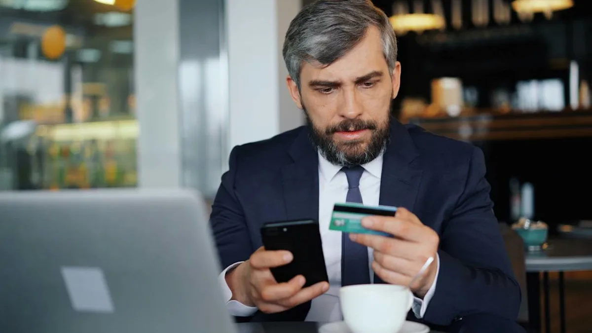 A small business owner holding a business credit card, illustrating what to know before applying.