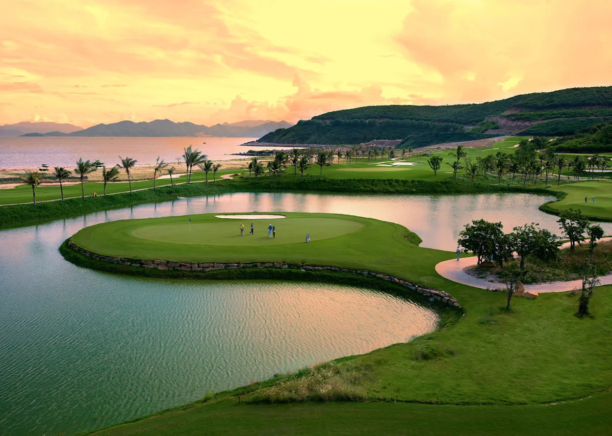 A golfer on a green spring fairway, illustrating the cheapest places to take a spring golf trip.