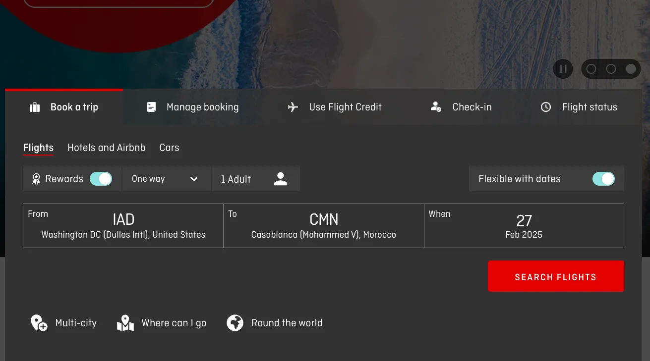 Screenshot of an airline booking widget with a Rewards toggle enabled, searching a one-way flight from Washington Dulles to Casablanca, Morocco