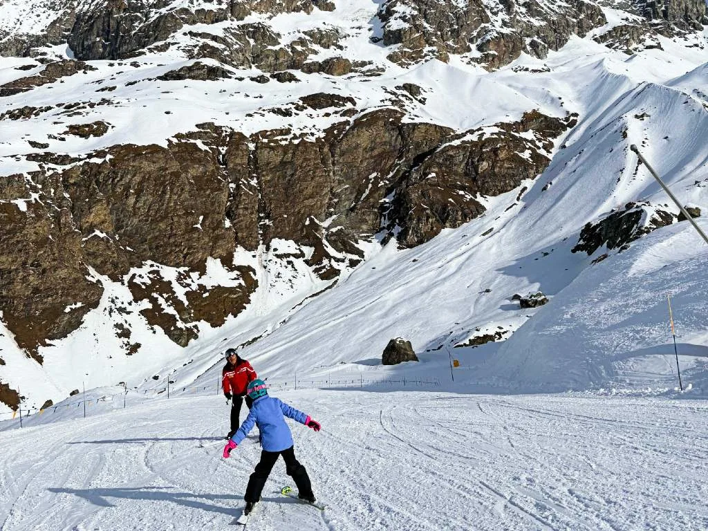 A snowy mountain ski resort, illustrating the cheapest places in the Northern Hemisphere to ski this winter.