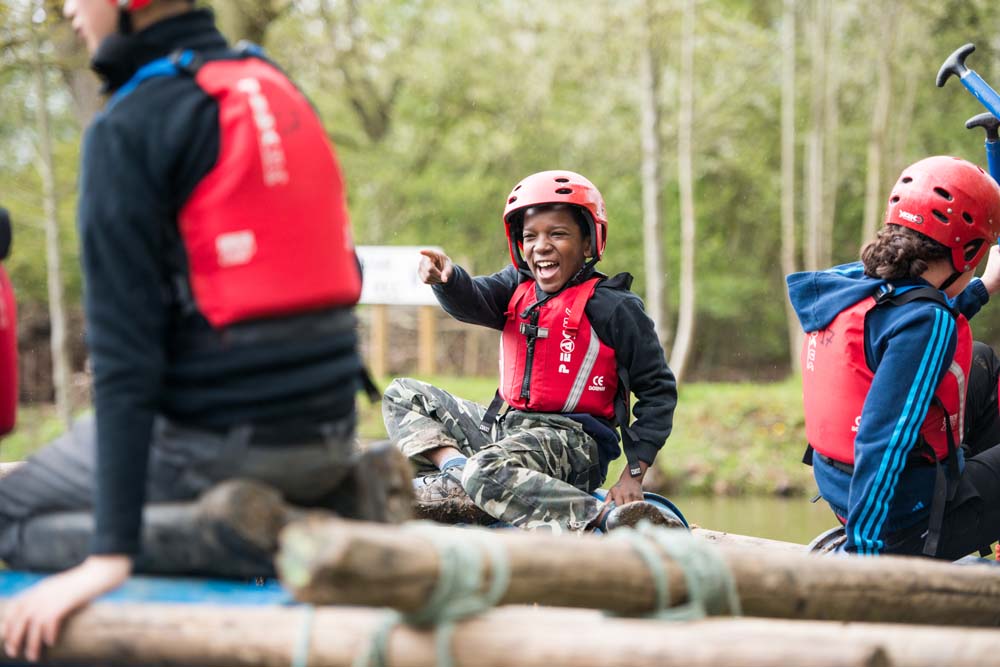 cub-on-raft-jpg