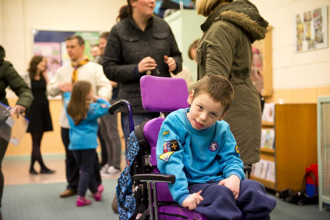 beaver-scout-in-wheelchair-at-colony-meeting-jpg