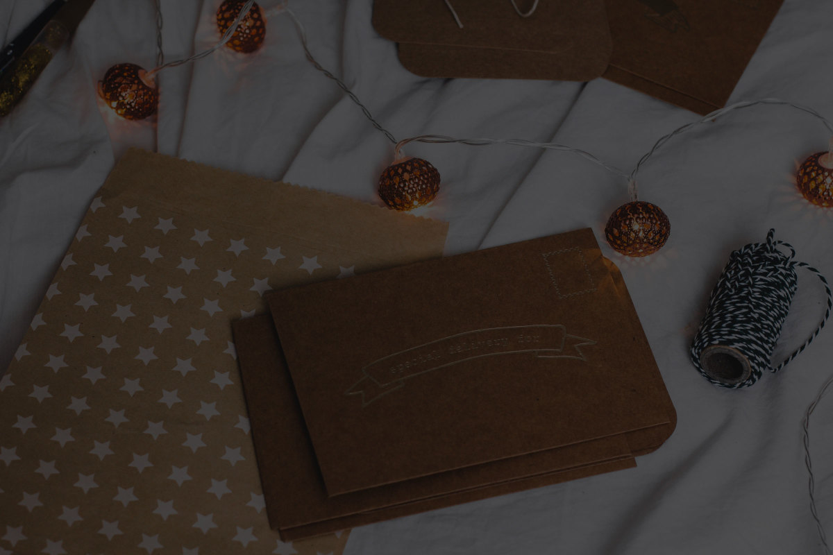 Brown paper packages with string and decorative lights