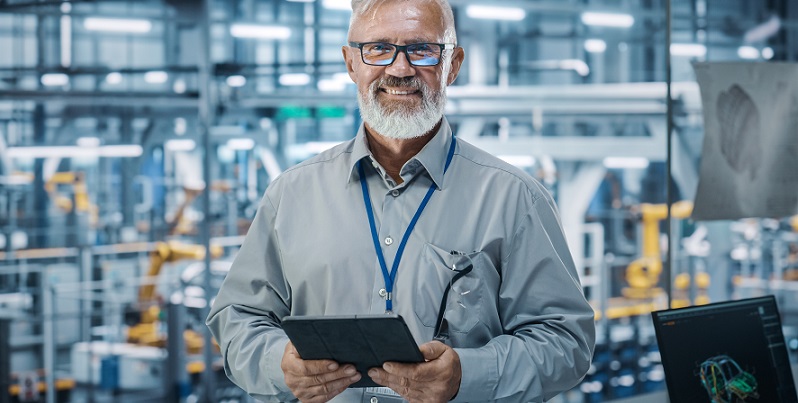 man holding an ipad