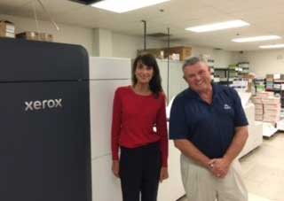 Staff of Flagship Press with their Xerox Iridesse Press