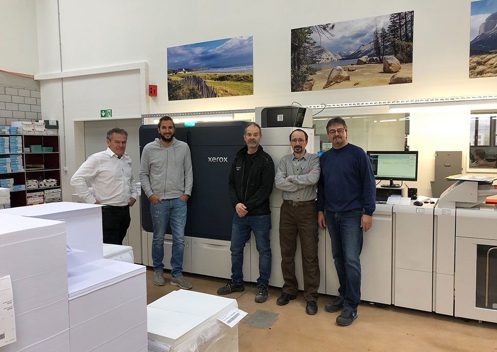 Staff of Mattenbach AG with their Xerox Iridesse Production Press