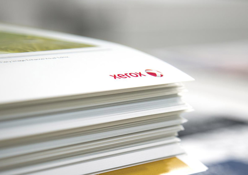 Stack of papers with a Xerox logo