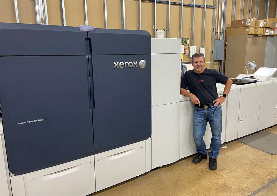 Staff of Cann Printing with their Xerox Iridesse Press