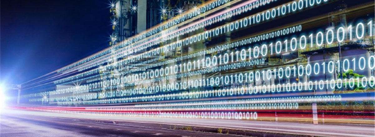 Rows of binary code across blurred lights on a highway