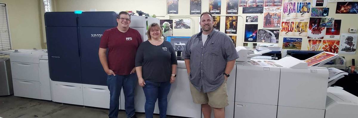 Staff of Reno Print Store with their Xerox Iridesse Press