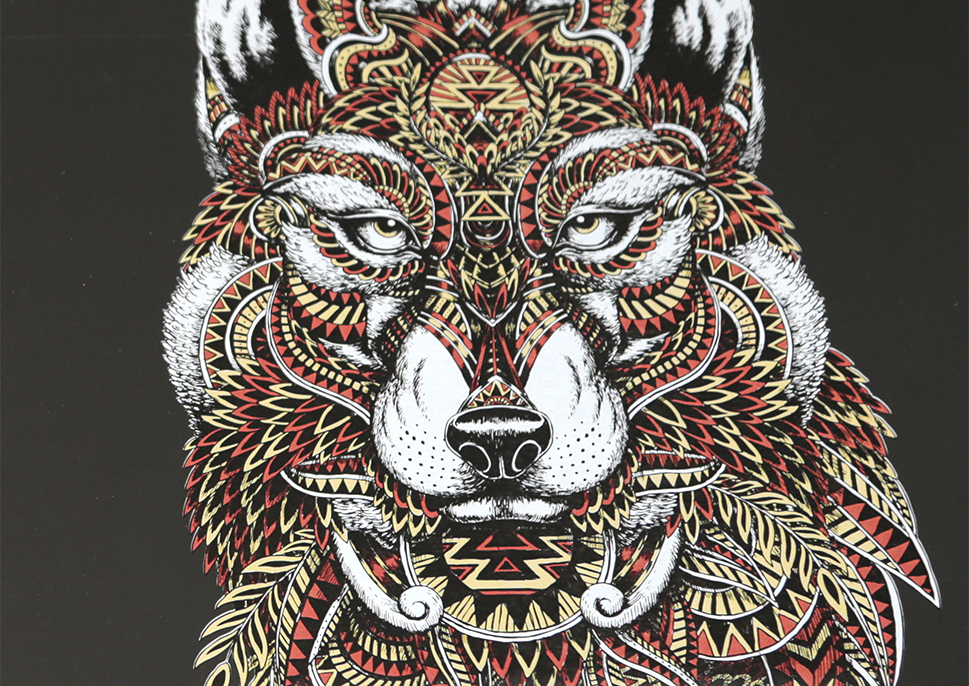 Stylized picture of a wolf with gold metallic ink